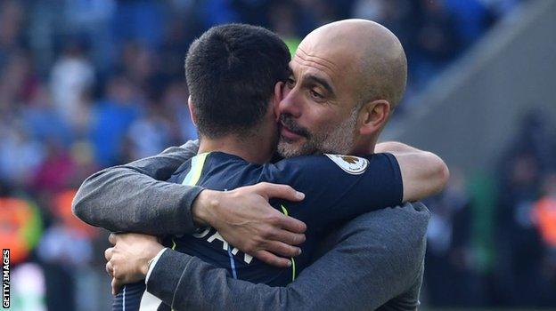 Pep Guardiola and Ilkay Gundogan embrace after winning the 2019 Premier League title