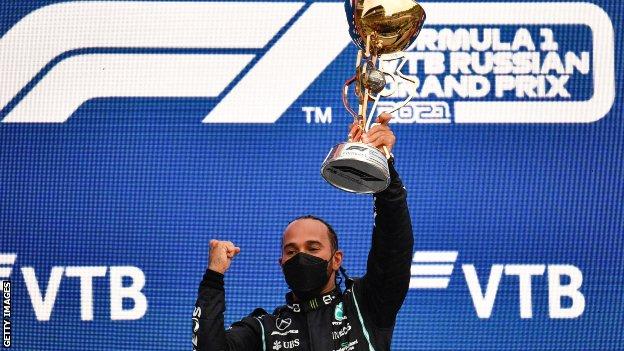 Lewis Hamilton celebrates after winning 2021 Russian Grand Prix