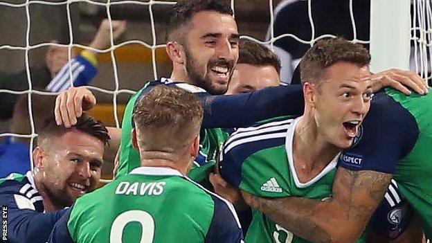 Northern Ireland celebrate Jonny Evans' goal