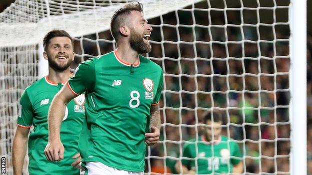 Daryl Murphy (right) celebrates his second goal in Friday's game as team-mate Shane Long also shows his delight