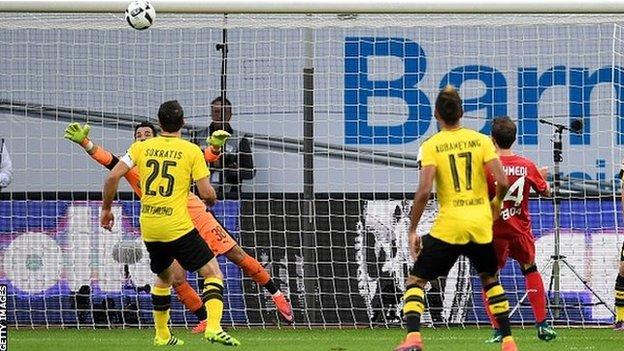 Admir Mehmedi (right) scores for Bayer Leverkusen against Borussia Dortmund