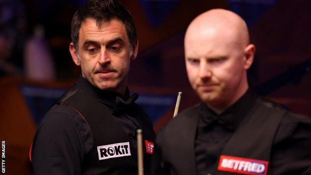 Ronnie O'Sullivan (left) and Anthony McGill