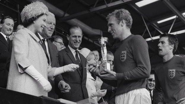 The Queen presents the 1966 World Cup to Bobby Moore