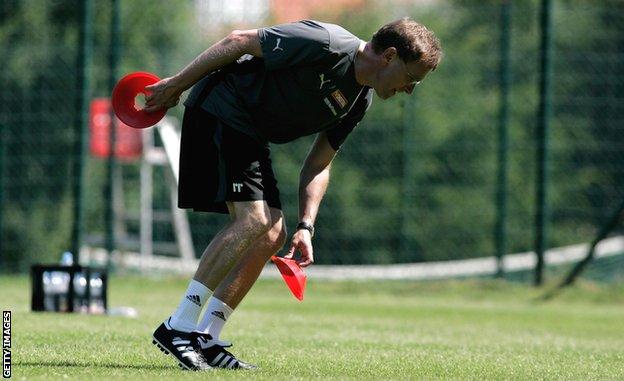 Rangnick, putting out training cones as Hoffenheim manager in 2008
