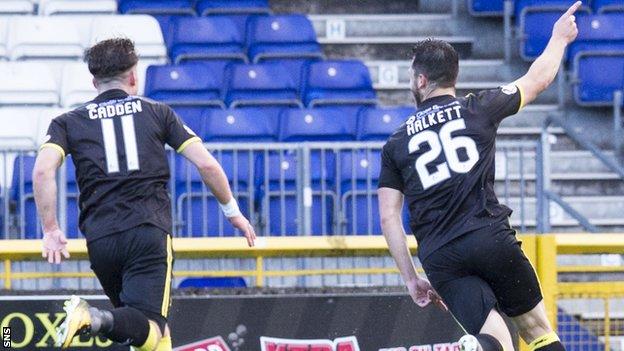 Craig Halkett celebrates