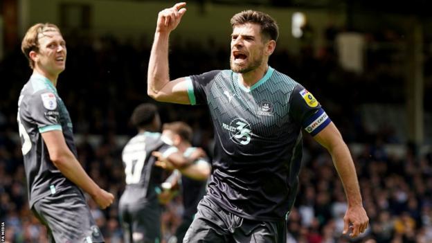 Joe Edwards celebrates scoring to put Argyle 2-1 up