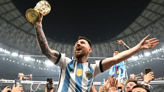 Lionel Messi lifting the World Cup for Argentina