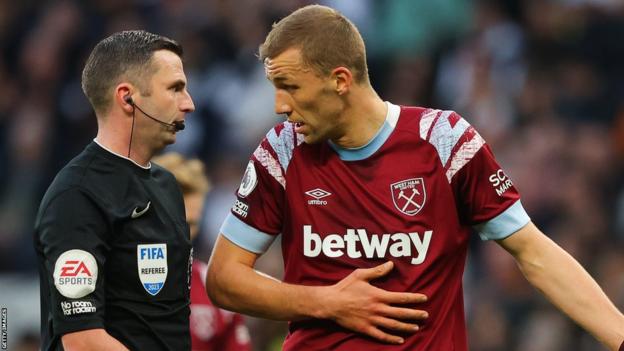 West Ham player argues with referee