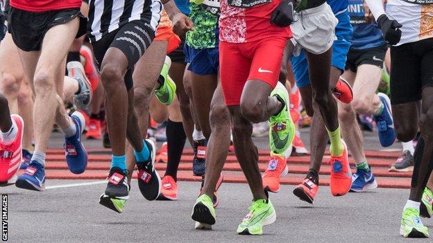 General shot of people running