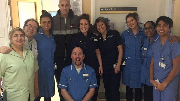 Travis Munn with staff at the London Royal Free Hospital