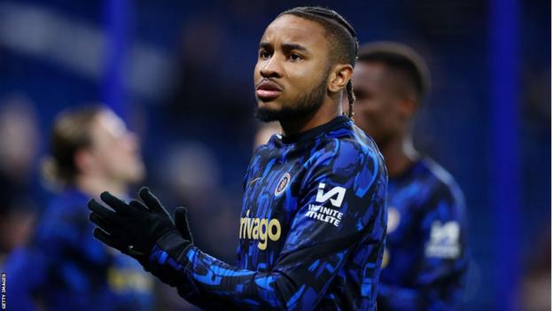 Christopher Nkunku applauds supporters