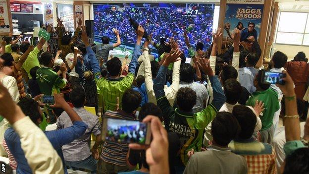 Cricket fans in Lahore watch the final