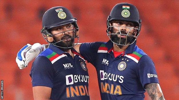 India batters Rohit Sharma (left) and Virat Kohli (right) embrace during a match