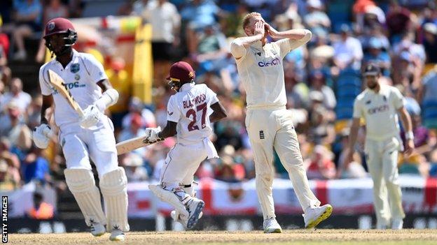 Ben Stokes looks dismayed as West Indies add more runs