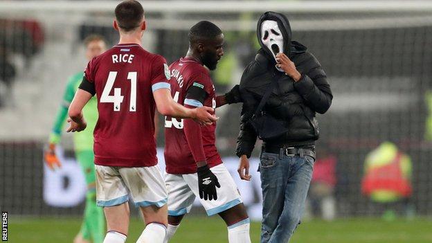 West Ham pitch invader