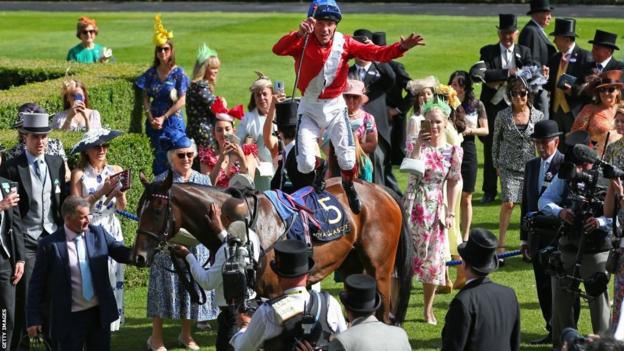 Frankie Dettori performs a flying dismount after winning the Coronation Stakes at Royal Ascot on Inspiral