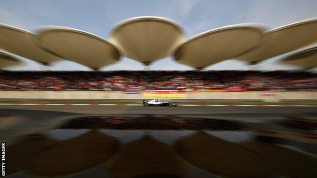 Chinese GP: Lewis Hamilton sports 'lucky' Chinese red for Mercedes