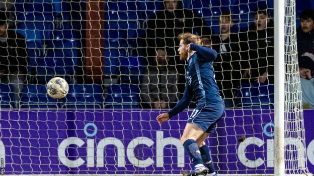 Ross County's Josh Sims scores to make it 1-0 during a cinch Premiership match between Ross County and Hibernian at the Global Energy Stadium