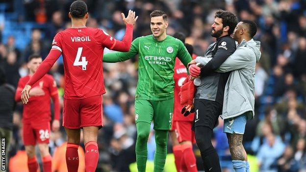 Manchester City and Liverpool players congratulate each other afterwards