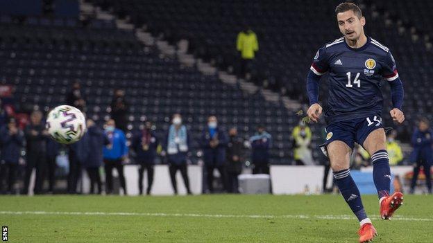 Kenny McLean converts Scotland's winning penalty in the shootout win over Israel