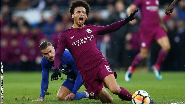 Joe Bennett tackles Leroy Sane