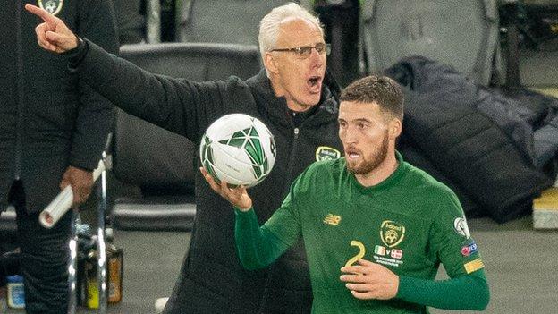 Matt Doherty is about to take a throw-in as Mick McCarthy shouts instructions during the Republic's 1-1 draw with Denmark in November