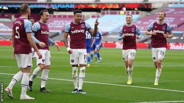 Jesse Lingard, centre, celebrates scoring for West Ham