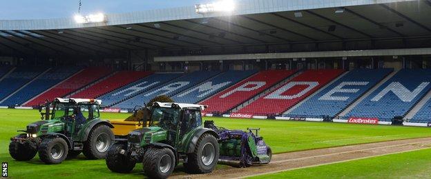 Work begins to relay the pitch at Hampden