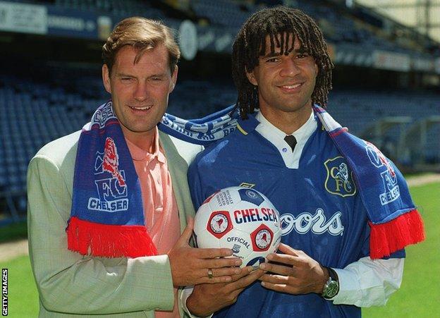 With his Chelsea kit on over a shirt and tie, Gullit is introduced to English football in June 1995