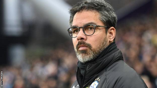 David Wagner stands on the touchline