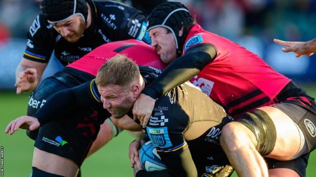 Ross Moriarty is halted by Rory Thornton