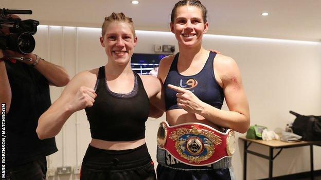 Rankin (left) visited the new champion in her changing room after the bout
