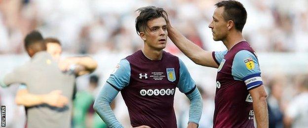 John Terry consoles Aston Villa team-mate Jack Grealish after the final whistle