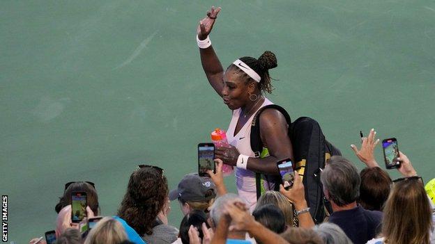 Serena Williams waves goodbye to the Cincinnati crowd after losing to Emma Raducanu
