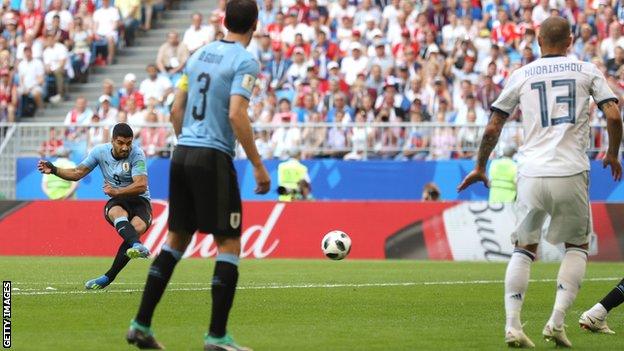 Luis Suarez celebrates scoring for Uruguay