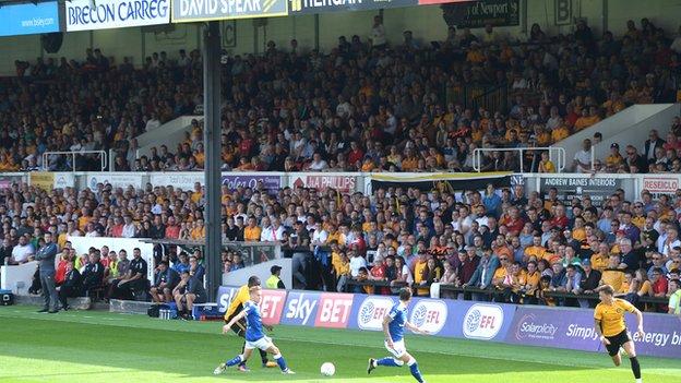 Newport County fans watch at Rodney Parade