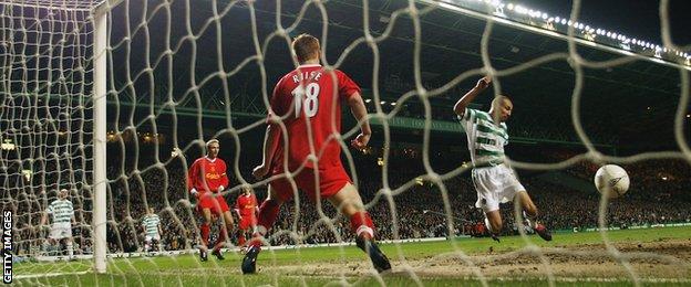 Henrik Larsson scores for Celtic against Liverpool in 2003