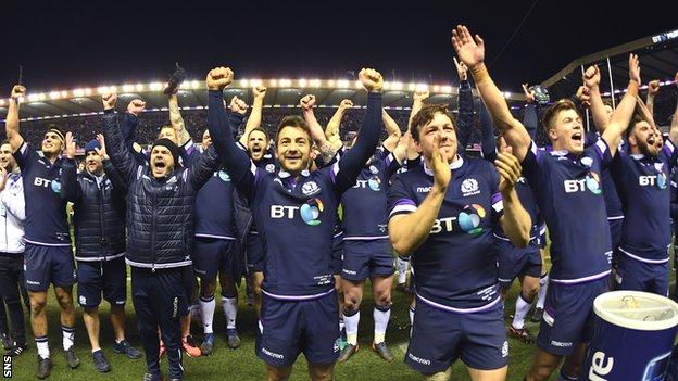 Scotland's players take the applause of supporters after their win over England