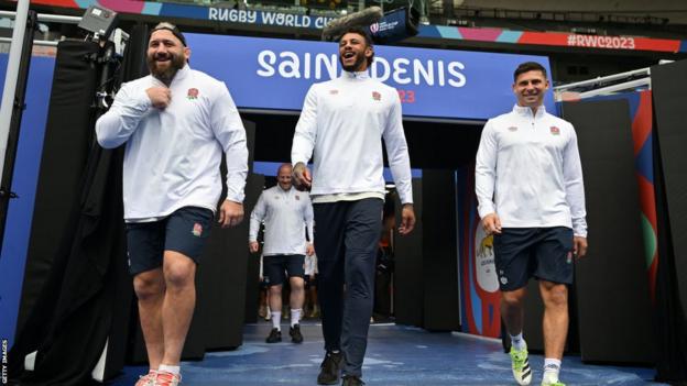 Joe Marler, Courtney Lawes and Ben Youngs walk out into the Stade de France with Dan Cole just behind