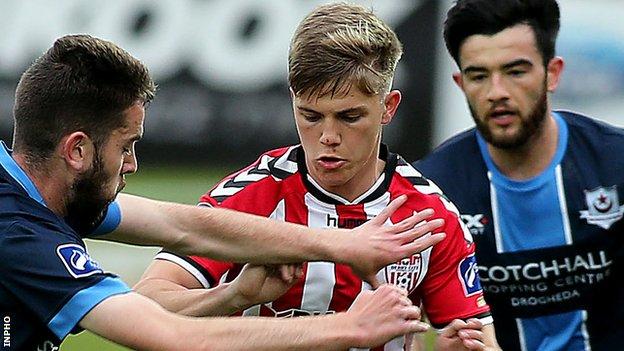 Derry City's Joshua Daniels in action against Drogheda dup Kenneth Costello and Adam Wixted