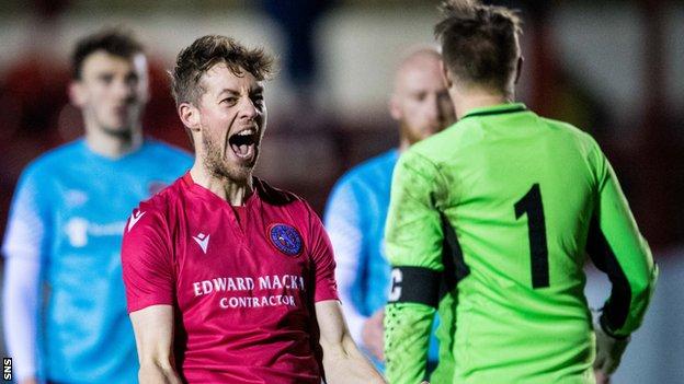 Brora's Martin MacLean celebrates his sides win at full time