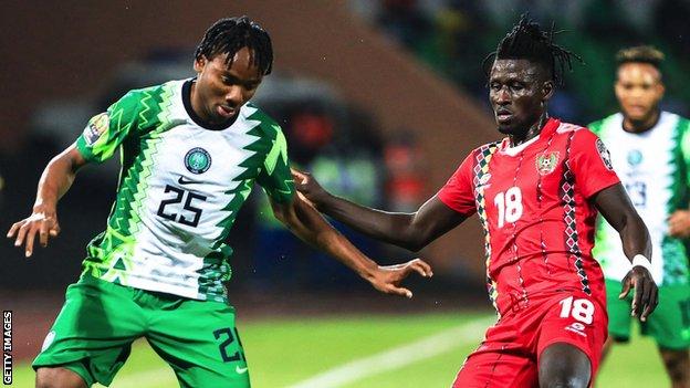 Kelechi Nwakali (left) in action for Nigeria against Guinea-Bissau