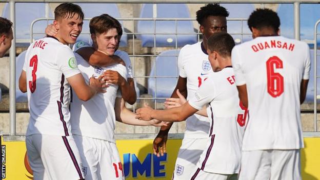 England's players celebrate scoring against Italy in the European Under-19 Championship semi-final