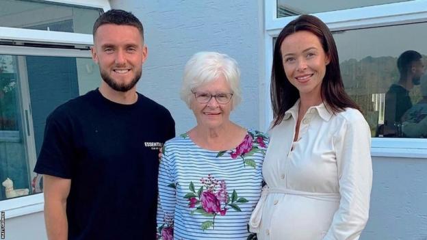 Matt Grimes with his fiancee Angela - who was pregnant at the time with daughter Myla - and her late grandmother Anne