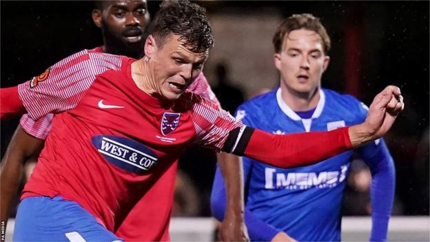 Dagenham skipper Matt Robinson scored the opening goal of the night at Gillingham