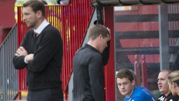 Both Ian Baraclough (left) and Gary Locke were unhappy at referee Steven McLean