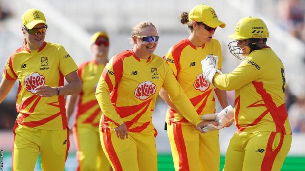 Trent Rockets players observe  a wicket