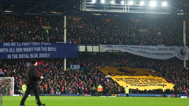 Fans of Everton protest against the Premier League