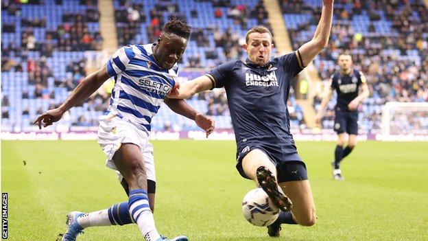 Defender Murray Wallace has signed a new long term deal to stay at Millwall
