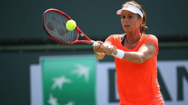 Varvara Lepchenko hitting a ball